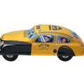 Old-school Tin Toy Taxi Sedan